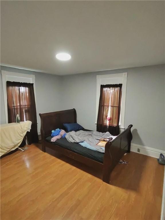 332 Hammond St, Sheraden, PA 15204 - bedroom featuring wood finished floors and baseboards