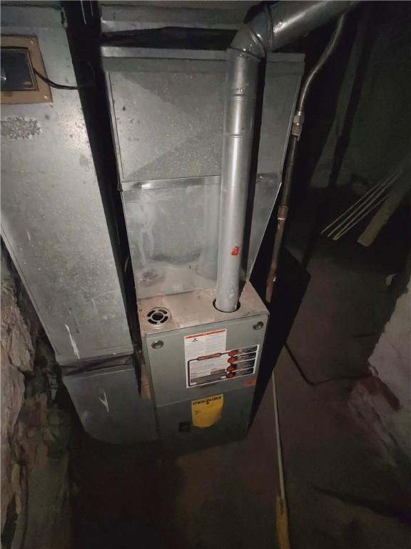 332 Hammond St, Sheraden, PA 15204 - utility room featuring heating unit