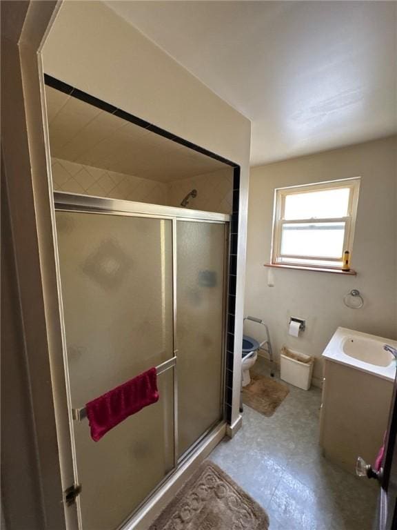 2709 Leland St, Perry Hilltop, PA 15214 - bathroom with a shower stall, vanity, toilet, and tile patterned floors