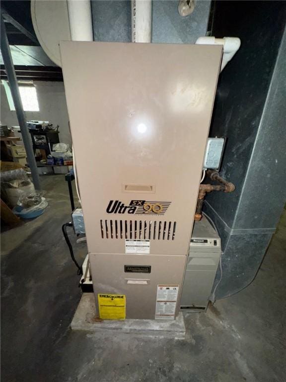 2709 Leland St, Perry Hilltop, PA 15214 - utility room featuring heating unit