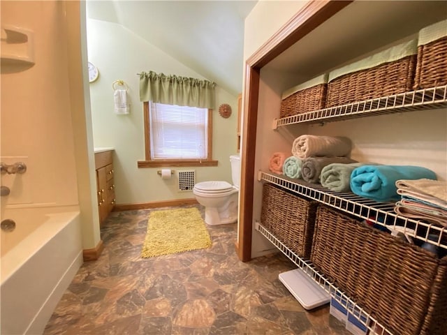 3 Kilbourne Rd, West Salem Twp, PA 16125 - full bathroom with toilet, lofted ceiling, a bath, vanity, and baseboards