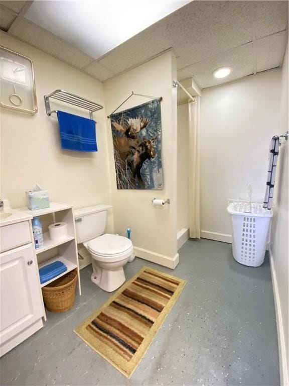 3 Kilbourne Rd, West Salem Twp, PA 16125 - bathroom featuring a stall shower, toilet, baseboards, and vanity