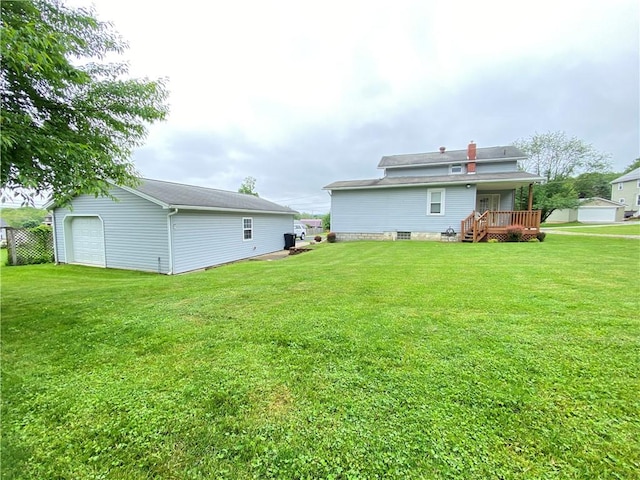 3 Kilbourne Rd, West Salem Twp, PA 16125 - rear view of house with a yard and a garage