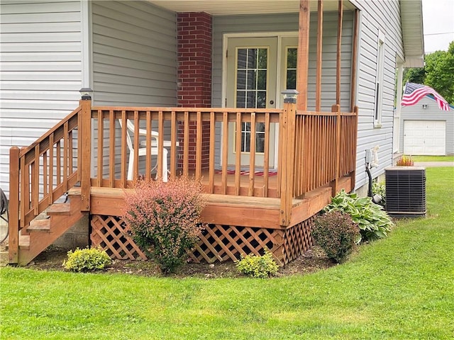 3 Kilbourne Rd, West Salem Twp, PA 16125 - deck with a lawn, cooling unit, and a detached garage