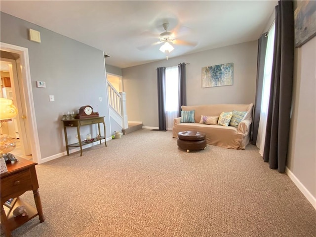 3 Kilbourne Rd, West Salem Twp, PA 16125 - carpeted living area with stairway, a ceiling fan, and baseboards