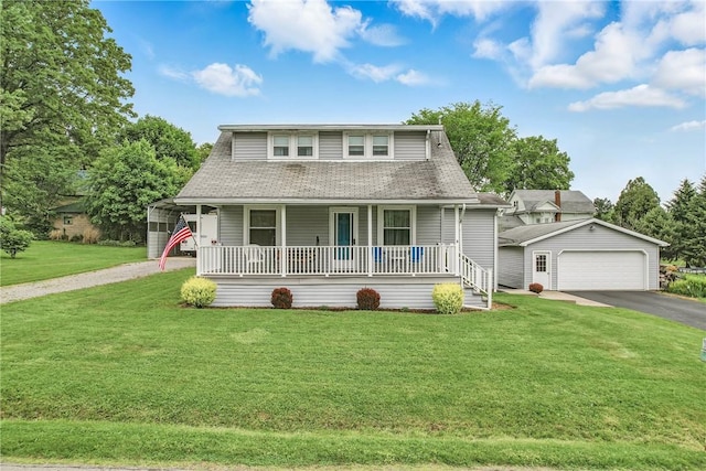 3 Kilbourne Rd, West Salem Twp, PA 16125 - bungalow-style home with a porch, asphalt driveway, a shingled roof, a front lawn, and an outbuilding