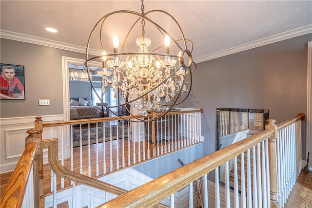 102 Maple Gln, Peters Twp, PA 15367 - detailed view of a chandelier, crown molding, and wood finished floors