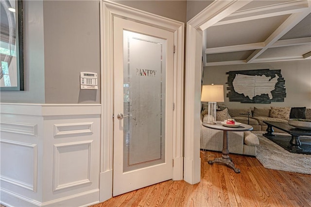 102 Maple Gln, Peters Twp, PA 15367 - corridor with coffered ceiling, light wood finished floors, and beam ceiling