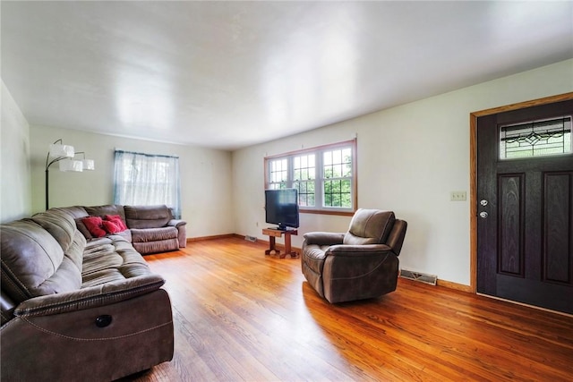 321 Green Acres Ln, Shenango Twp Law, PA 16101 - living area with wood finished floors and baseboards