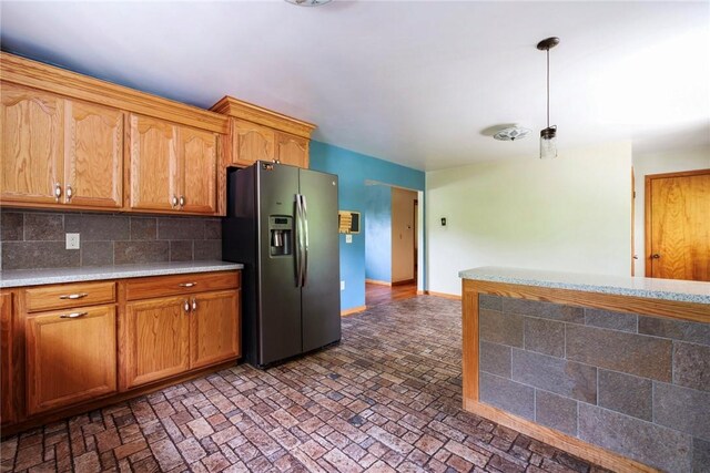 321 Green Acres Ln, Shenango Twp Law, PA 16101 - kitchen with stainless steel fridge with ice dispenser, light countertops, brick patterned flooring, backsplash, and baseboards