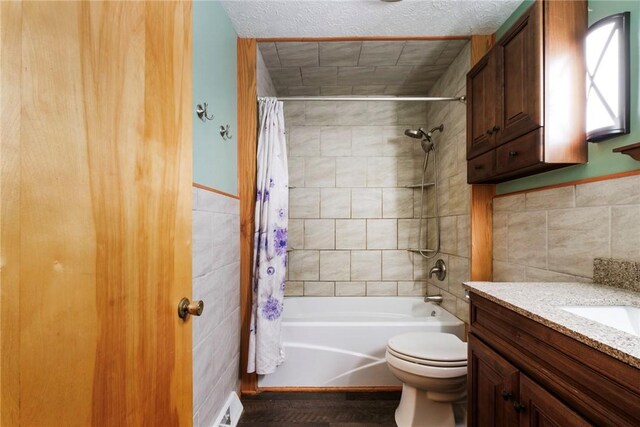 321 Green Acres Ln, Shenango Twp Law, PA 16101 - full bath featuring tile walls, shower / bath combination with curtain, toilet, wood finished floors, and vanity