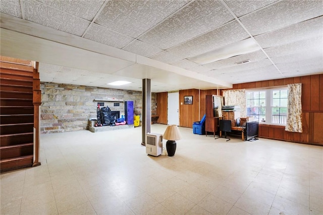 321 Green Acres Ln, Shenango Twp Law, PA 16101 - below grade area featuring tile patterned floors, a paneled ceiling, stairs, and wooden walls