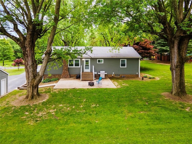321 Green Acres Ln, Shenango Twp Law, PA 16101 - back of property featuring a patio area, a yard, and crawl space