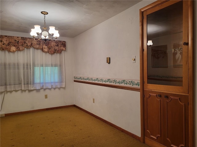 118 Wide View Ter, Unity Twp, PA 15650 - spare room featuring light colored carpet, a chandelier, and baseboards