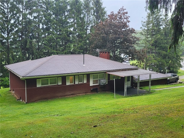 118 Wide View Ter, Unity Twp, PA 15650 - rear view of house with a lawn and a chimney