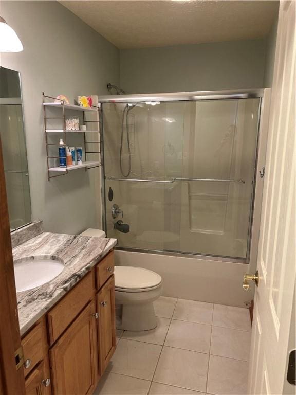 1016 Noble Pine Ct, Penn Twp Wml, PA 15085 - bathroom featuring tile patterned flooring, vanity, shower / bath combination with glass door, and toilet
