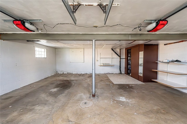 118 Cortland Dr, Hempfield Twp Wml, PA 15672 - basement with concrete block wall and a garage