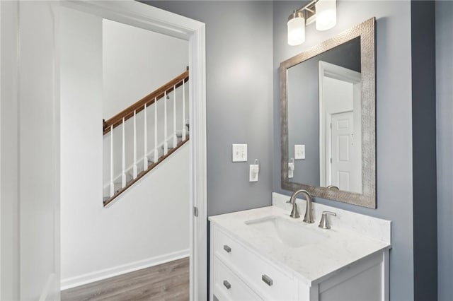 215 Old Hickory Rd, Jackson Twp But, PA 16063 - bathroom with wood finished floors, vanity, and baseboards