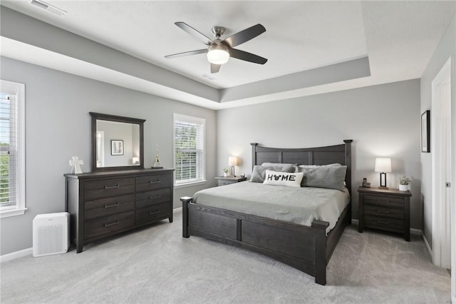 215 Old Hickory Rd, Jackson Twp But, PA 16063 - bedroom with light carpet, baseboards, a tray ceiling, and a ceiling fan