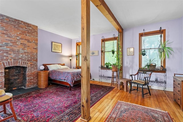 534 Trenton Ave, Regent Square, PA 15221 - bedroom featuring wood-type flooring, a fireplace, and baseboards
