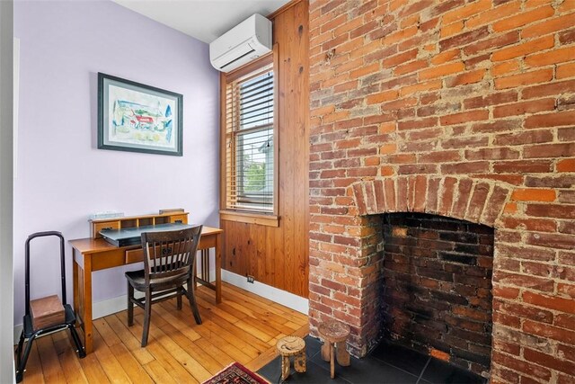 534 Trenton Ave, Regent Square, PA 15221 - office area featuring a wall mounted air conditioner, baseboards, and light wood-style floors