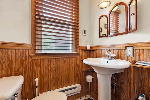 534 Trenton Ave, Regent Square, PA 15221 - half bath featuring a wainscoted wall, toilet, a baseboard heating unit, and wooden walls