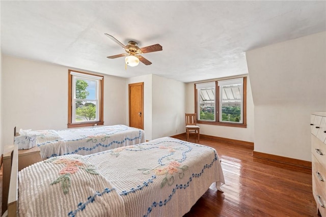 1068 Lakeview Dr, Unity Twp, PA 15650 - bedroom featuring wood finished floors, ceiling fan, and baseboards