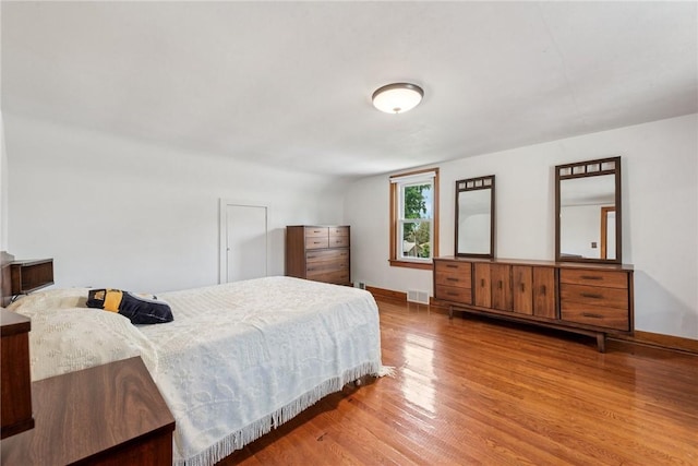 1068 Lakeview Dr, Unity Twp, PA 15650 - bedroom with wood finished floors and baseboards