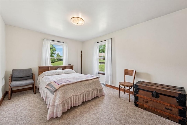 1068 Lakeview Dr, Unity Twp, PA 15650 - bedroom featuring light carpet and baseboards