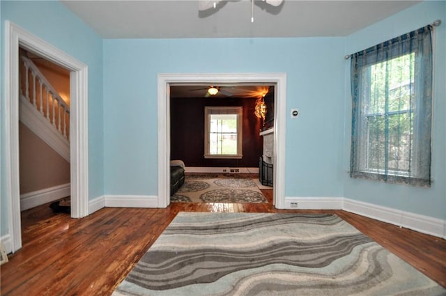 222 Orchard Ave, Canonsburg, PA 15317 - bedroom featuring wood finished floors, baseboards, a fireplace, and ceiling fan