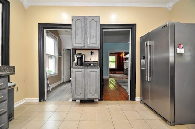 222 Orchard Ave, Canonsburg, PA 15317 - kitchen with high end refrigerator, ornamental molding, light tile patterned floors, gray cabinetry, and baseboards
