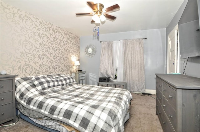 222 Orchard Ave, Canonsburg, PA 15317 - carpeted bedroom featuring wallpapered walls, an accent wall, baseboards, and a ceiling fan