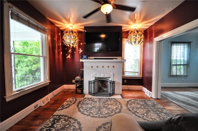 222 Orchard Ave, Canonsburg, PA 15317 - living area with a chandelier, baseboards, and a fireplace with flush hearth