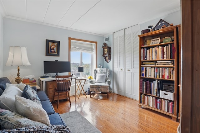 5 Bayard Rd Unit 913, Shadyside, PA 15213 - living area featuring crown molding and wood finished floors