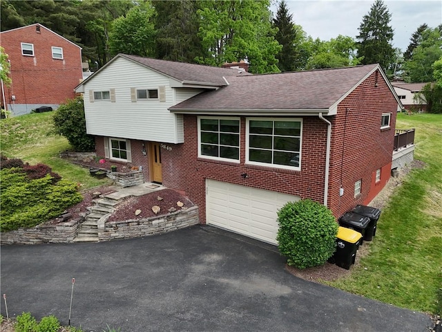 5849 Wilson Dr, Bethel Park, PA 15102 - split level home with brick siding, a garage, driveway, roof with shingles, and a chimney