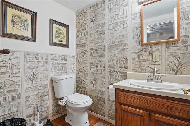 5849 Wilson Dr, Bethel Park, PA 15102 - half bath featuring toilet, vanity, and wood finished floors