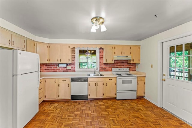 187 Friar Ln, Peters Twp, PA 15317 - kitchen with white appliances, under cabinet range hood, light countertops, a sink, and tasteful backsplash