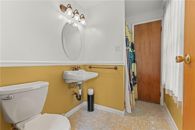 187 Friar Ln, Peters Twp, PA 15317 - bathroom featuring toilet, baseboards, and a sink