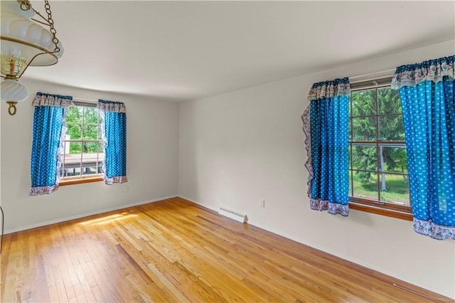 187 Friar Ln, Peters Twp, PA 15317 - empty room with hardwood / wood-style floors and baseboards