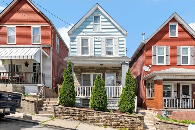 239 Albert St, Mt Washington, PA 15211 - view of front facade with a porch and stone siding