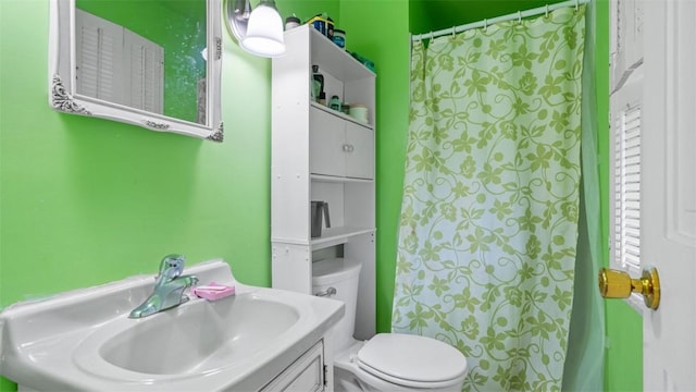 4817 E Willock Rd, Baldwin Boro, PA 15227 - bathroom with a sink, toilet, and a shower with shower curtain