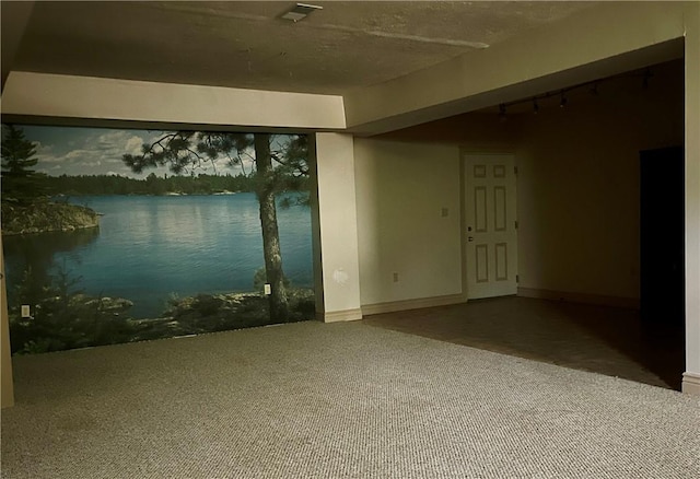 1849 Dutch Ridge Rd, Wayne Twp Law, PA 16117 - unfurnished room featuring carpet, rail lighting, baseboards, and a water view