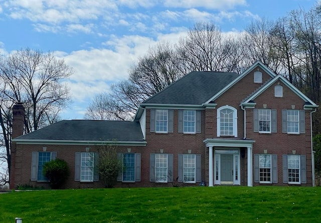 1849 Dutch Ridge Rd, Wayne Twp Law, PA 16117 - colonial house with a chimney, a front yard, and brick siding