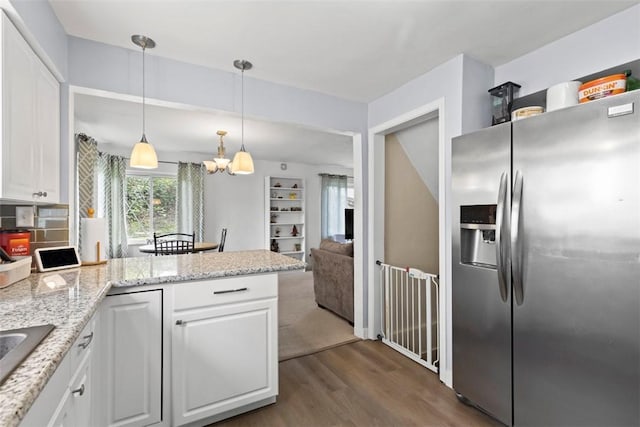 3050 S Park Rd, Bethel Park, PA 15102 - kitchen featuring stainless steel refrigerator with ice dispenser, dark wood finished floors, a peninsula, white cabinetry, and a chandelier