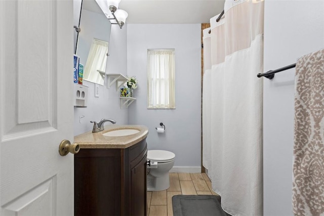 3050 S Park Rd, Bethel Park, PA 15102 - full bathroom featuring vanity, toilet, curtained shower, and baseboards