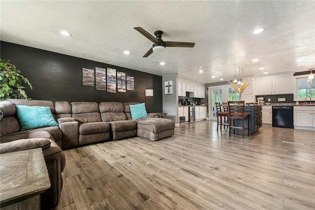415 Governor Dr, Shaler, PA 15101 - living room with recessed lighting, light wood-style floors, a ceiling fan, and healthy amount of natural light