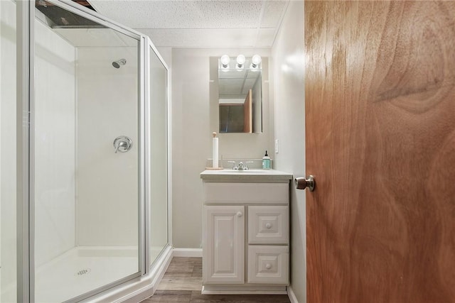 415 Governor Dr, Shaler, PA 15101 - full bath with a stall shower, vanity, wood finished floors, and baseboards