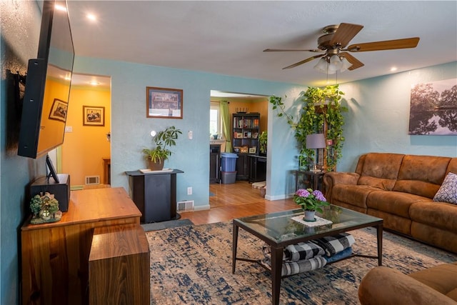 600 Margaret St, Mount Oliver, PA 15210 - living room with ceiling fan, wood finished floors, baseboards, and recessed lighting