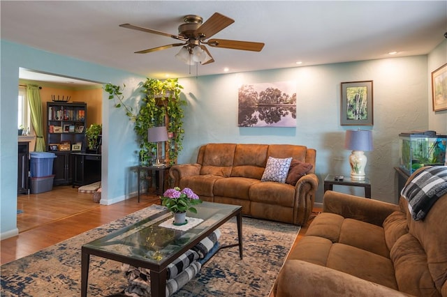 600 Margaret St, Mount Oliver, PA 15210 - living area with wood finished floors, ceiling fan, recessed lighting, and baseboards