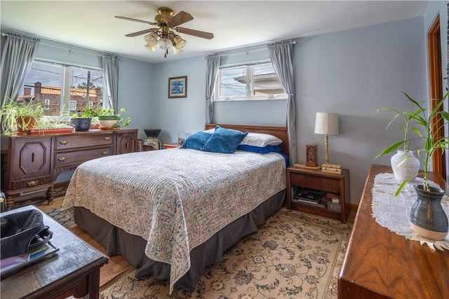 600 Margaret St, Mount Oliver, PA 15210 - bedroom with multiple windows, light wood finished floors, and ceiling fan